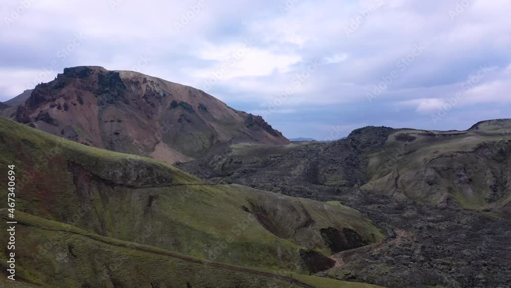 Iceland. Landmannalaugar is a famous area of colorful rhyolite mountains. Lava fields, and unique hiking trails. Iceland. Landmannalaugar is a famous area of colorful rhyolite mountains. Lava fields, and unique hiking trails.