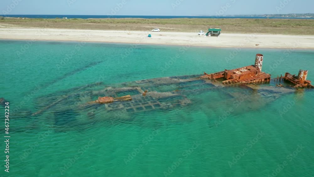 Aerial view of shipwreck in the sea, beach Aerial view of shipwreck in the sea, beach
