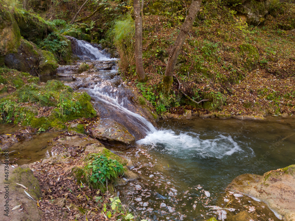 Obraz premium Rapids and cascades near the Gostilje waterfall on the slopes of the Zlatibor mountain in Serbia