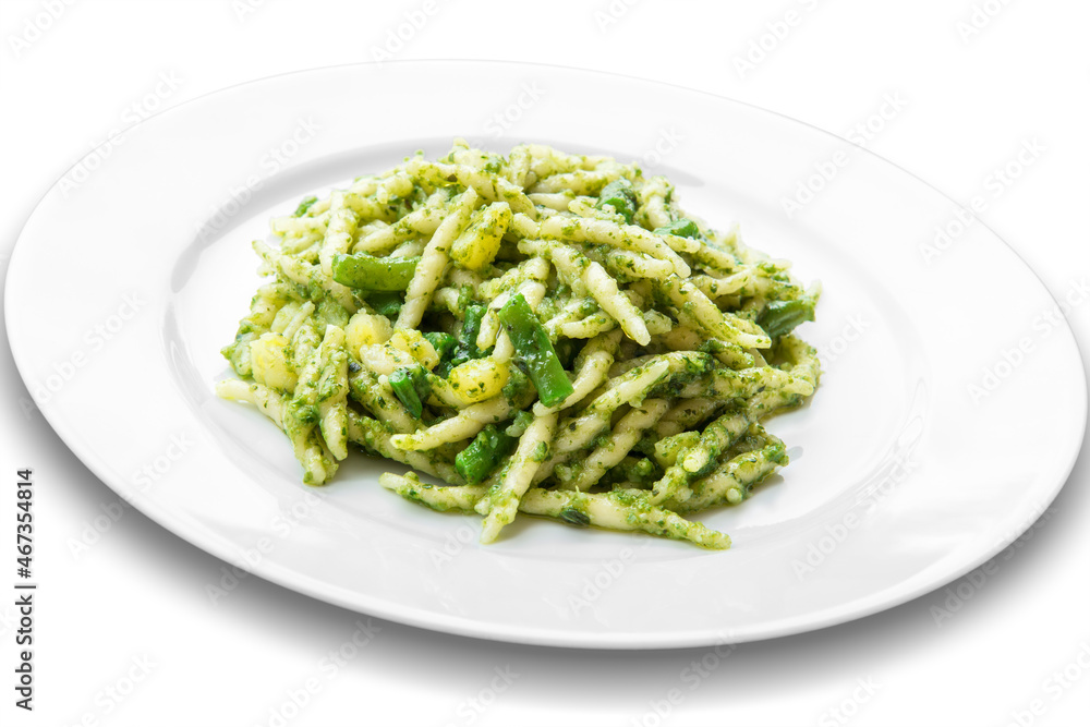 Plate of trofie pasta with Genoese pesto Plate of trofie pasta with Genoese pesto