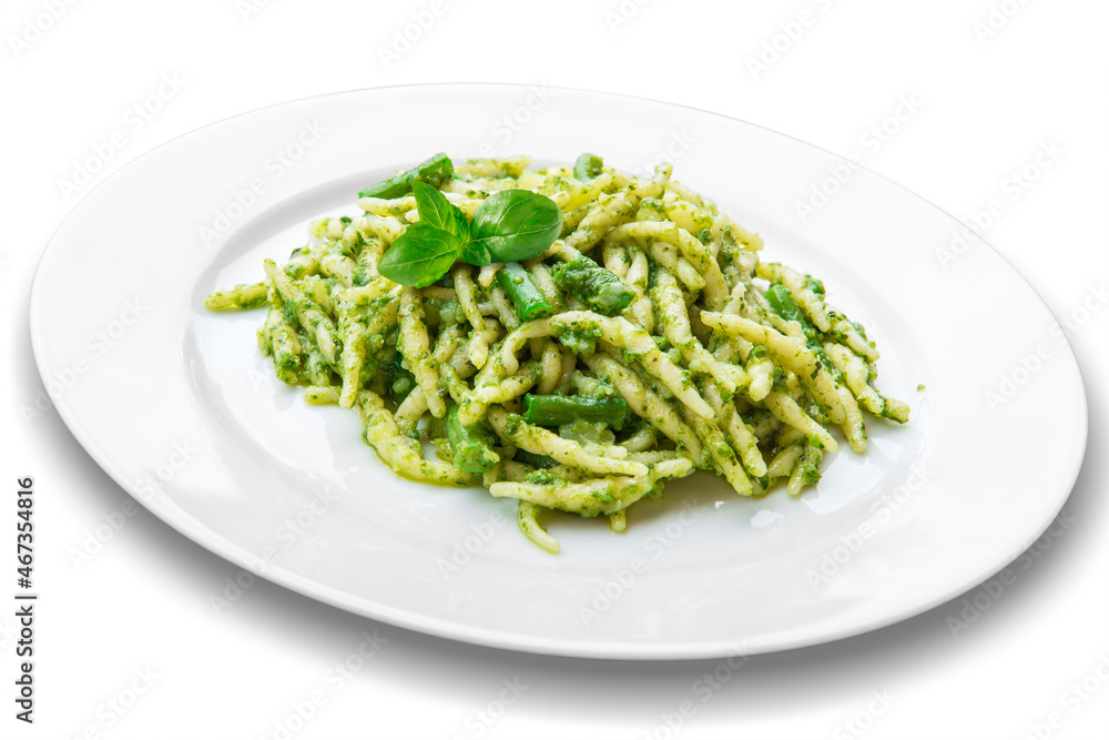 Plate of trofie pasta with Genoese pesto Plate of trofie pasta with Genoese pesto