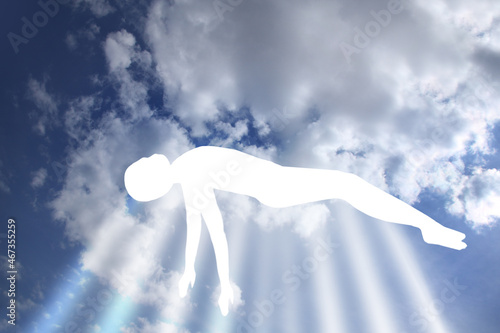 immortal soul of the deceased ascends to heaven, disembodied ghost of a person, white silhouette in heavenly light, postmortal transition, concept of dream, ascension and meditation photo