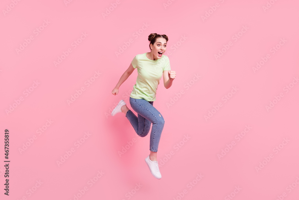 Profile photo of careless crazy pretty lady jump run fast scream wear green t-shirt isolated on pink background Profile photo of careless crazy pretty lady jump run fast scream wear green t-shirt isolated on pink background