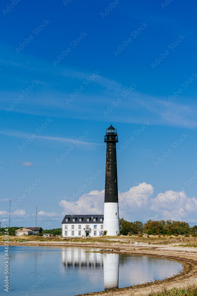 Sorve lighthouse on the Sorve Peninsula in Saaremaa, Estonia. Beautiful black and white lighthouse on the coast of the Baltic Sea Sorve lighthouse on the Sorve Peninsula in Saaremaa, Estonia. Beautiful black and white lighthouse on the coast of the Baltic Sea