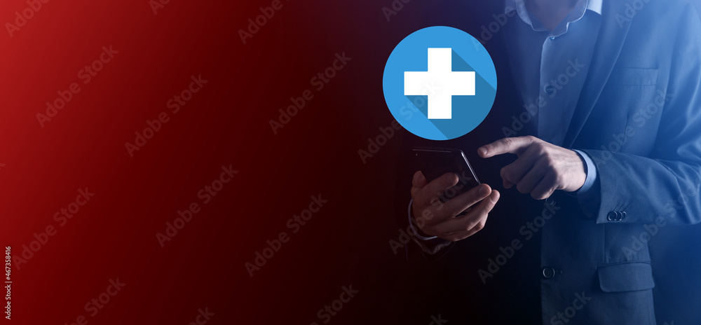 Obraz premium Businessman hold plus icon, man hold in hand offer positive thing such as profit, benefits, development, CSR represented by plus sign.The hand shows the plus sign.flat icons with long shadows