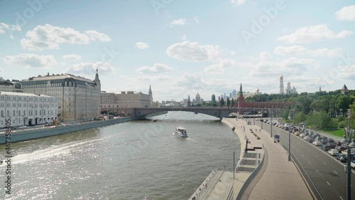 A ship sails along a river channel in Moscow