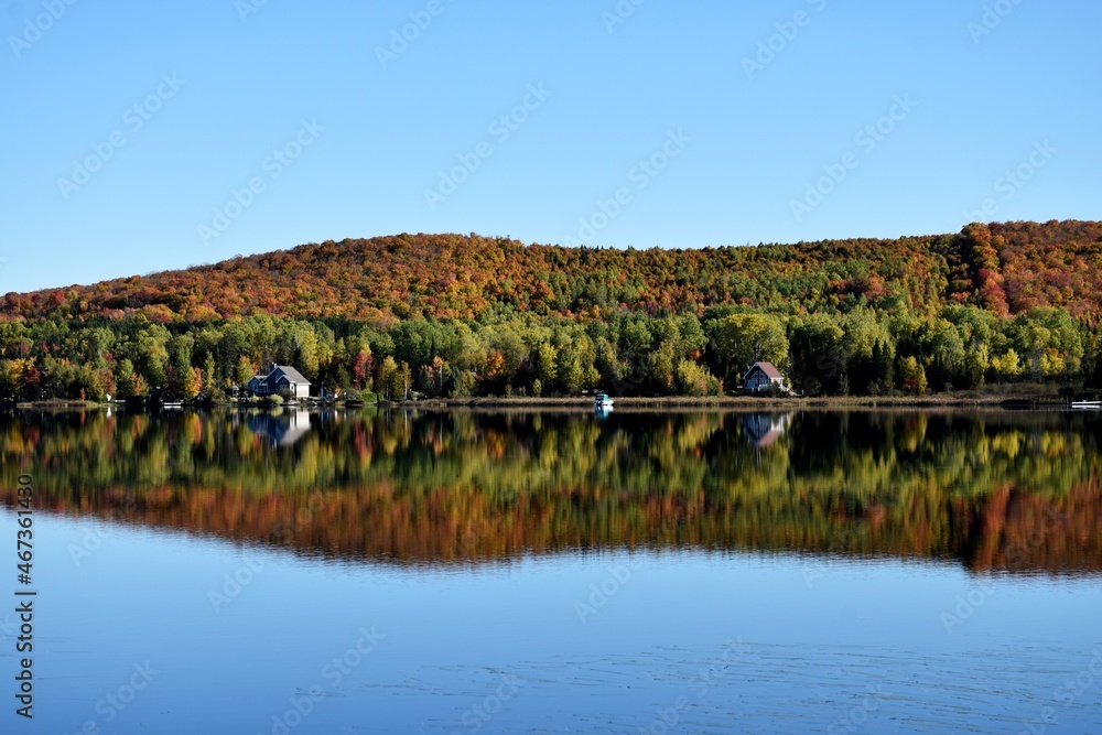 Autumn reflection on the lake, Québec, Canada
