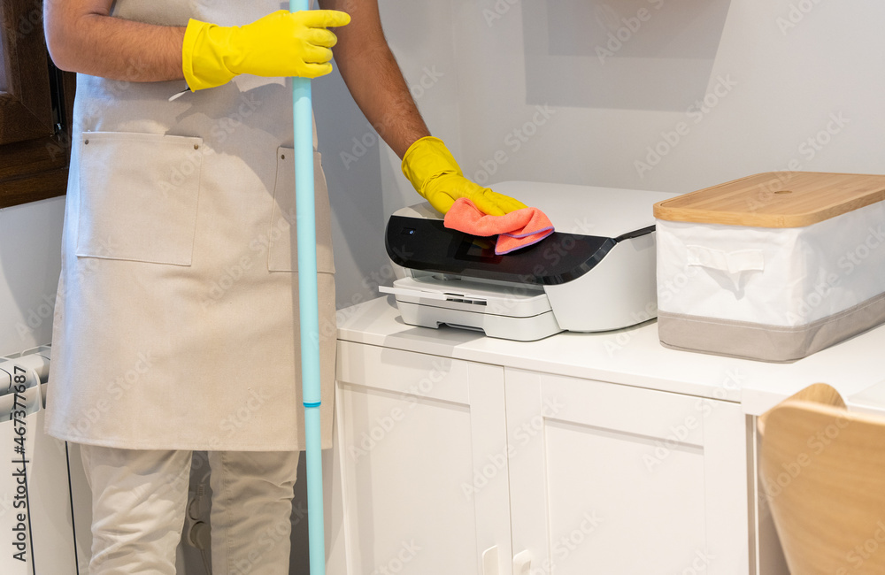 Crop professional housekeeper cleaning working room Crop professional housekeeper cleaning working room