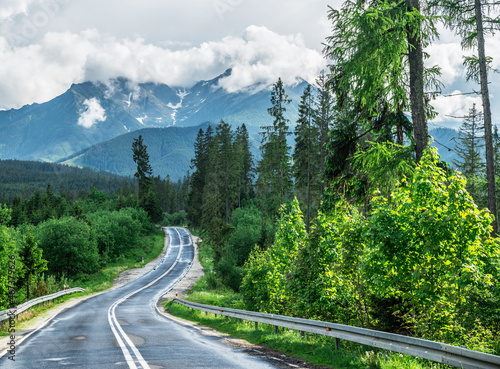 Road and High Tatras tops covered with cloud.