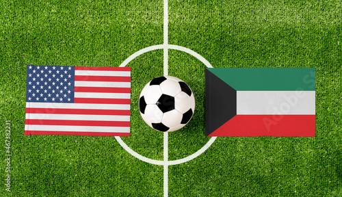 Top view soccer ball with USA vs. Kuwait flags match on green football field.