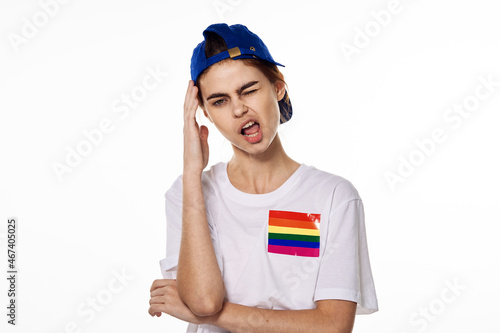 woman wearing white t-shirt lgbt flag inventor community