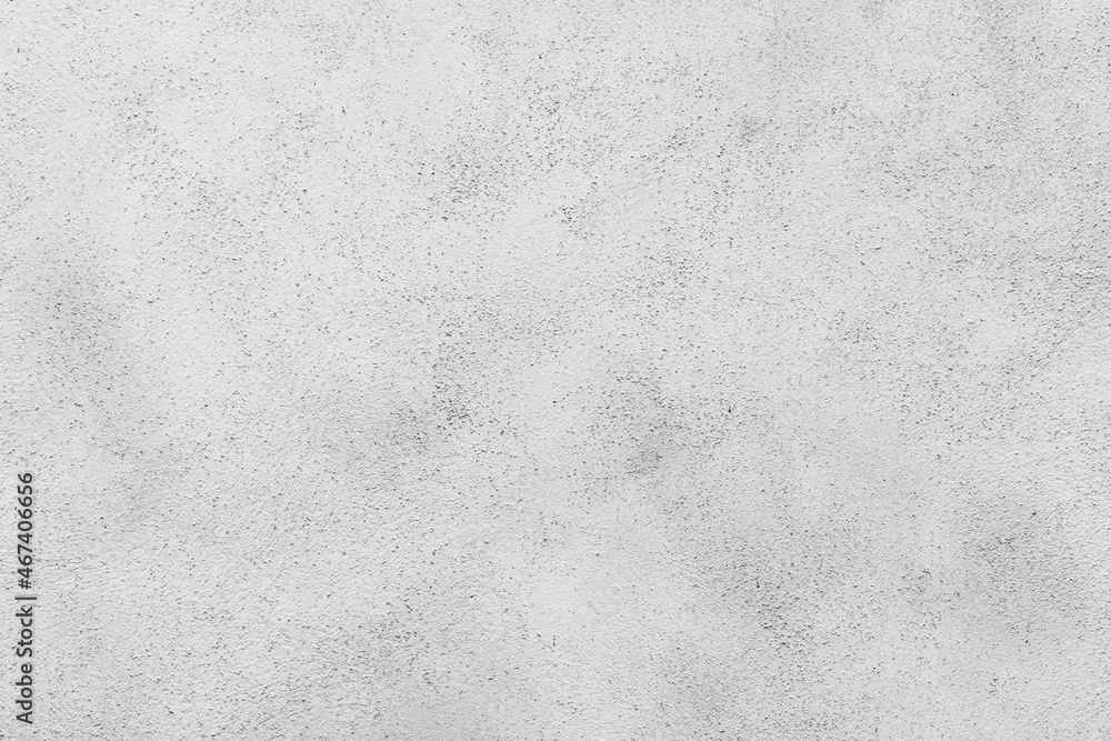 Obraz premium White concrete wall with relief plastering pattern. background texture