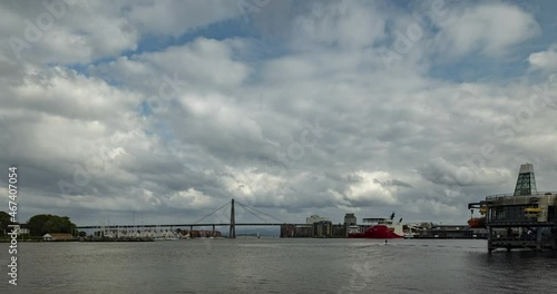 Oil muesum in stavanger port, marine traffic under the city bridge towards Stavanger harbor photo