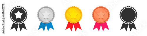 Set of golden winner medals with star and ribbon