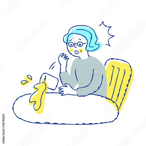 お茶をこぼすシニア女性