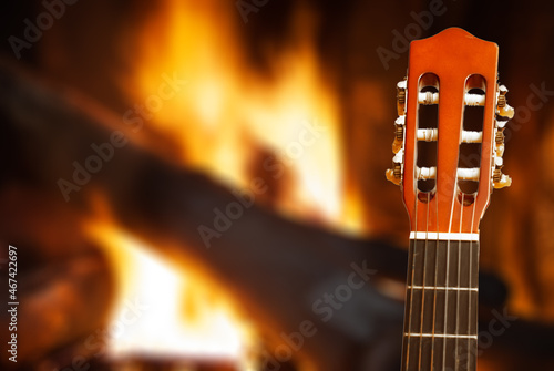 Guitar neck in front of the fireplace