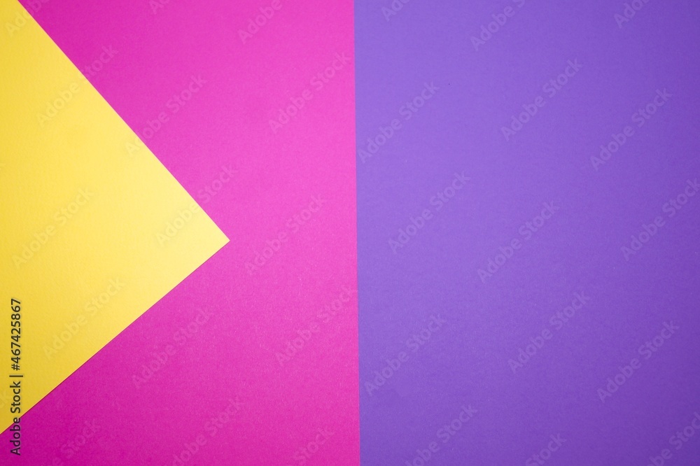 Graphic background of different geometric shapes in three colors: pink, yellow, purple. Graphic background of different geometric shapes in three colors: pink, yellow, purple.