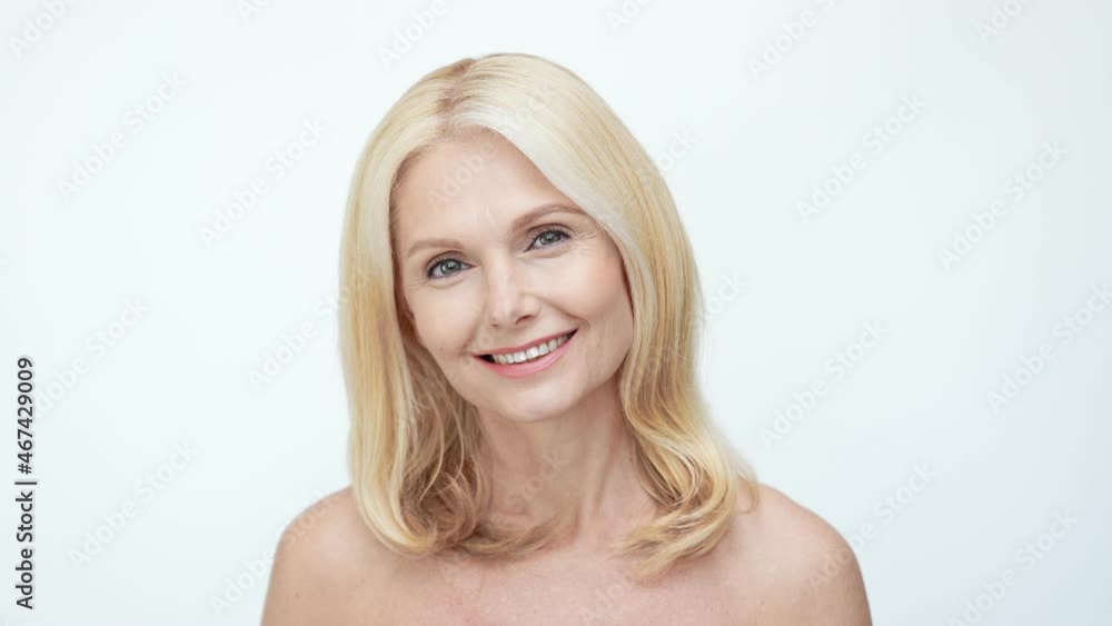 Retired dream lady bath time look camera away beaming smile Retired dream lady bath time look camera away beaming smile