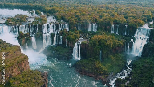 Beautiful aerial view of the Iguaçu Falls from a helicopter, one of the Seven Natural Wonders of the World. Foz do Iguaçu, Paraná, Brazil. 4K. photo