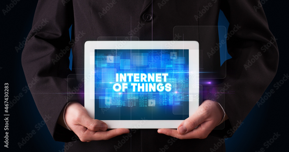 Person holding tablet, technology concept Person holding tablet, technology concept
