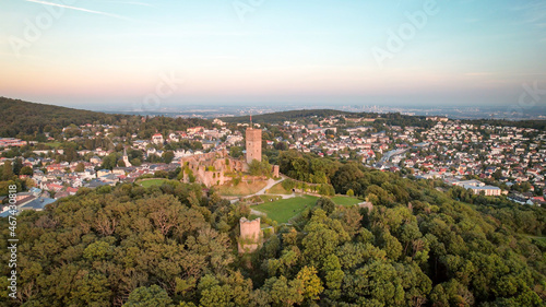 Wallpaper Mural Aerial view over castle Königstein am Taunus to skyline of Frankfurt Main at horizon at sundown Torontodigital.ca