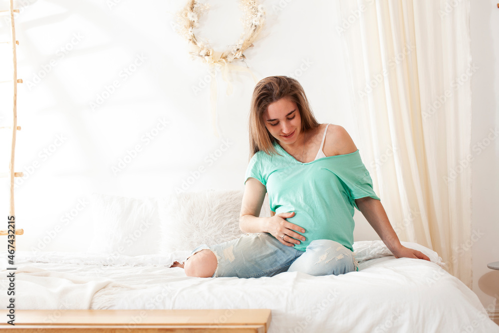 young pretty caucasian pregnant woman posing cheerful at home, lifestyle people concept young pretty caucasian pregnant woman posing cheerful at home, lifestyle people concept