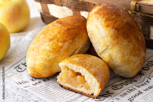 baked pies with apples and cinnamon on baking paper