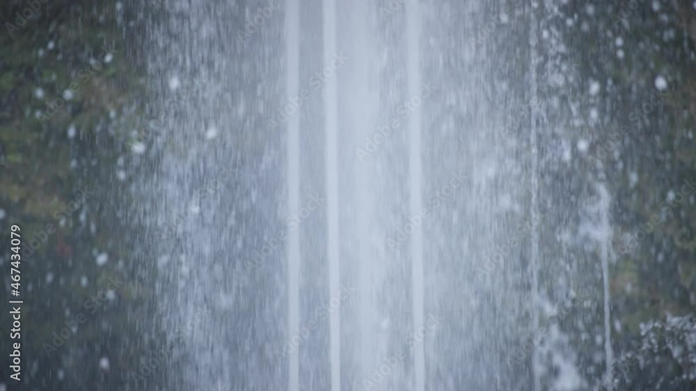 Close up of a strong water stream in a fountain. Slow motion. Close up of a strong water stream in a fountain. Slow motion.