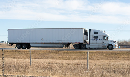 Heavy Cargo on the Road. A truck hauling freight along a highway