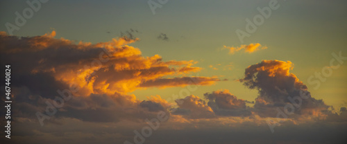 Sunset Cloudscape Panorama with wave shaped cloud formation