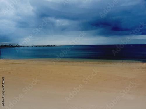 Clouds over the sea and desert beach © abeadev