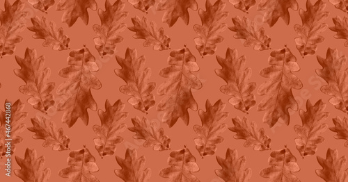 Cover oak leaves pattern on a orange.