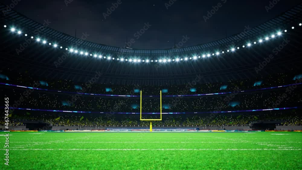 American football night stadium with fans iilluminated by spotlights waiting game. High quality 4k footage American football night stadium with fans iilluminated by spotlights waiting game. High quality 4k footage