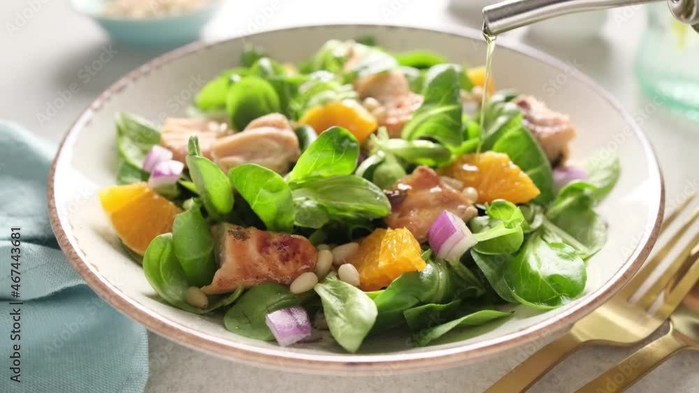 Christmas salmon orange salad with pine nuts, red onion and corn salad lettuce Christmas salmon orange salad with pine nuts, red onion and corn salad lettuce