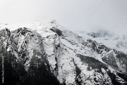 Panoramic view of the snow-capped mountains in hornopiren national park on a winter day. © RafaelAnRios