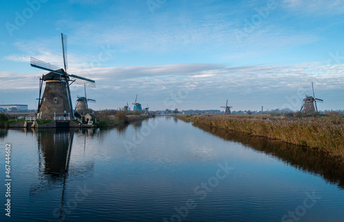 Ancient windmills on the edge of the canal at Kinderdijk, Netherlands