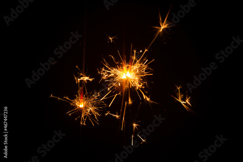 burning sparkler on a black background