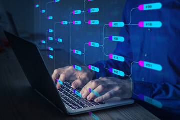 Programming and designing software architecture with node tree. Abstract technology concept with person UML Unified Modeling Language on computer. Data relationship visualization.