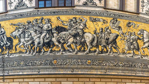 The famous Procession of Princes (german: Fuerstenzug) in Dresden, Germany, is a large mural of a mounted procession of the rulers of Saxony. The picture consists of 23,000 Tiles of Meissen Porcelain. photo