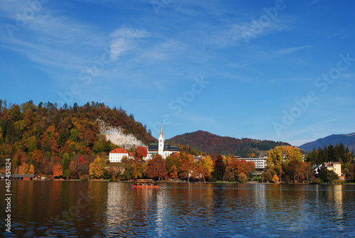 Scenic view of the Bled lake, island with church, Bled castle, mountains