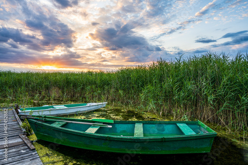 Fototapeta Naklejka Na Ścianę i Meble -  Boats in the bay during the sunset.