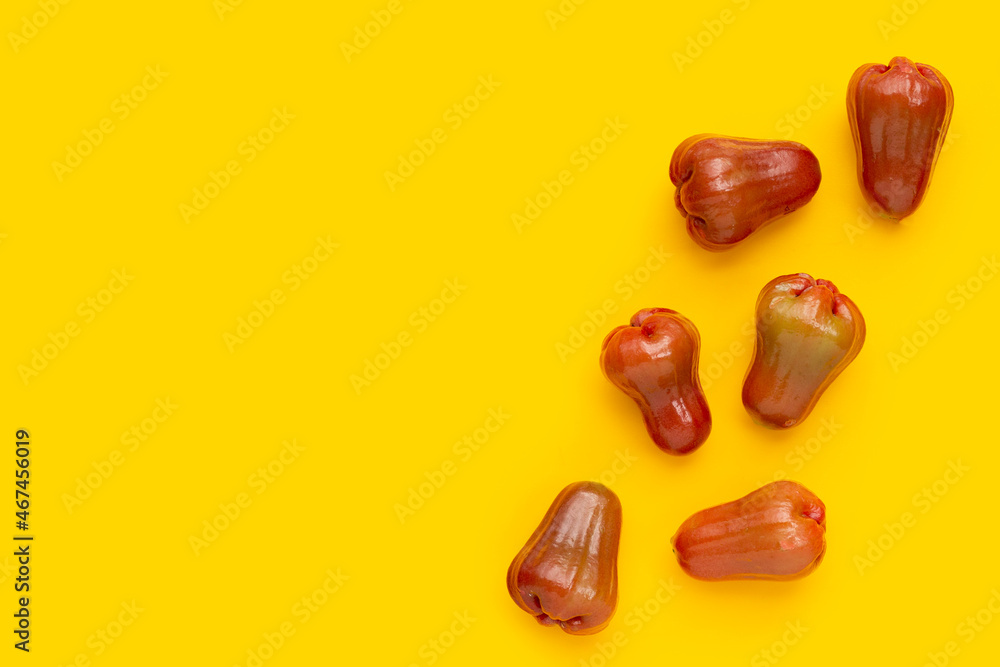 Rose apple on yellow background Rose apple on yellow background
