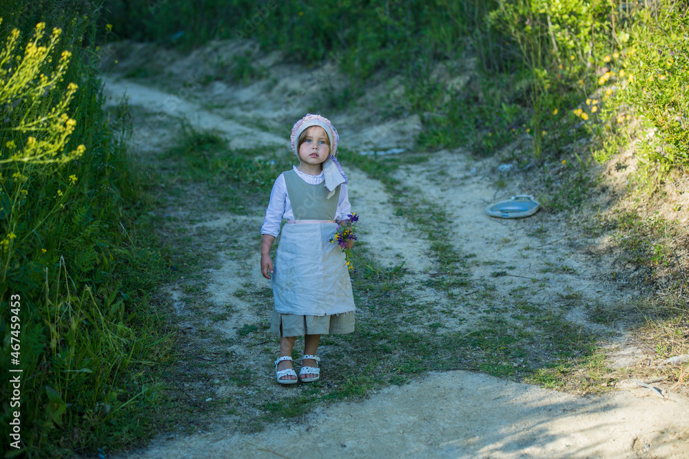 child walking in the forest child walking in the forest
