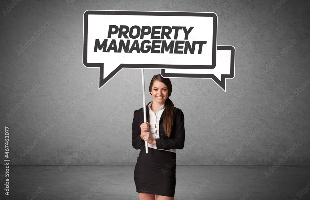 business person in casual holding road sign business person in casual holding road sign