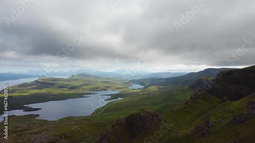 Aerial view of Loch Leathan in valley next to the Old Man Storr rock formation - Scotland - Isle of Skye photo