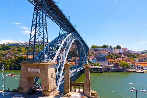 View of Dom Luis I Bridge (Ponte Luis I) and Duoro river in Porto city, Portugal. Famous travel destination © katatonia
