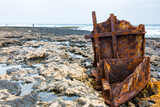 rusty ruins on the shore
