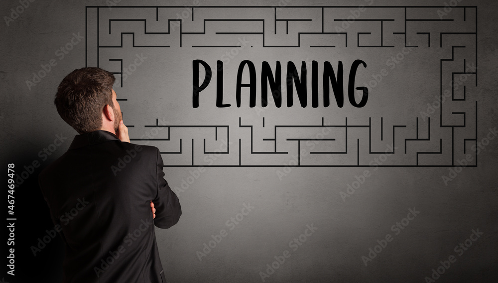 businessman drawing maze concept businessman drawing maze concept