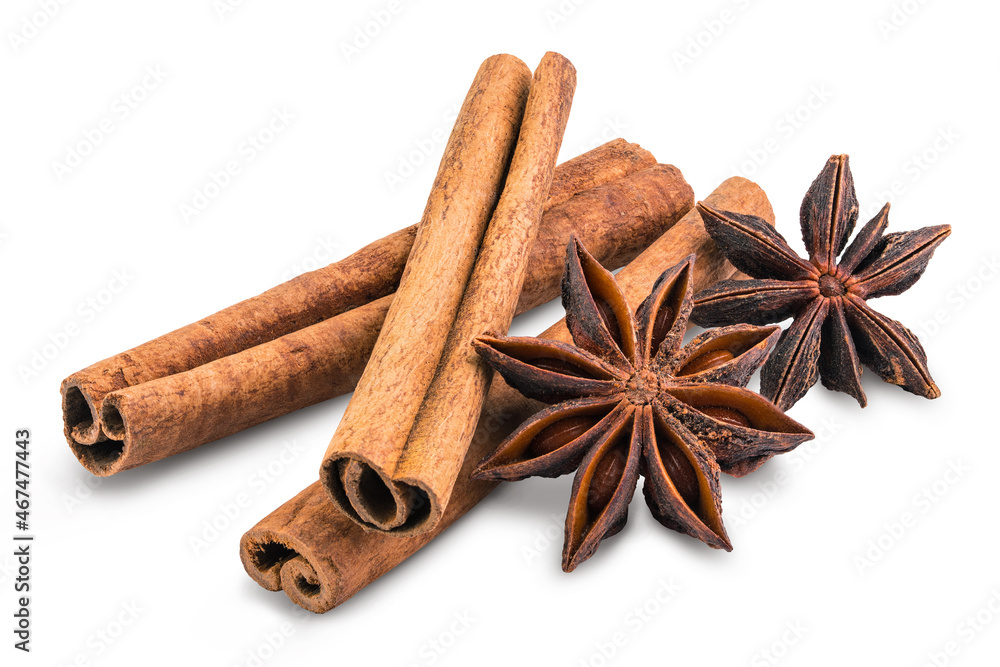 Cinnamon sticks, Anise stars. Dried cinnamon stick. Aromatic spices for Drink, cooking or baking. Isolated white background. Macro High resolution photo. Professional food photography. Cinnamon sticks, Anise stars. Dried cinnamon stick. Aromatic spices for Drink, cooking or baking. Isolated white background. Macro High resolution photo. Professional food photography.
