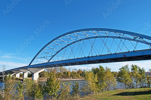 The Amelia Earhart Memorial Bridge is a network tied arch bridge over the Missouri River on U.S. Route 59 between Atchison  Kansas and Buchanan County  Missouri.